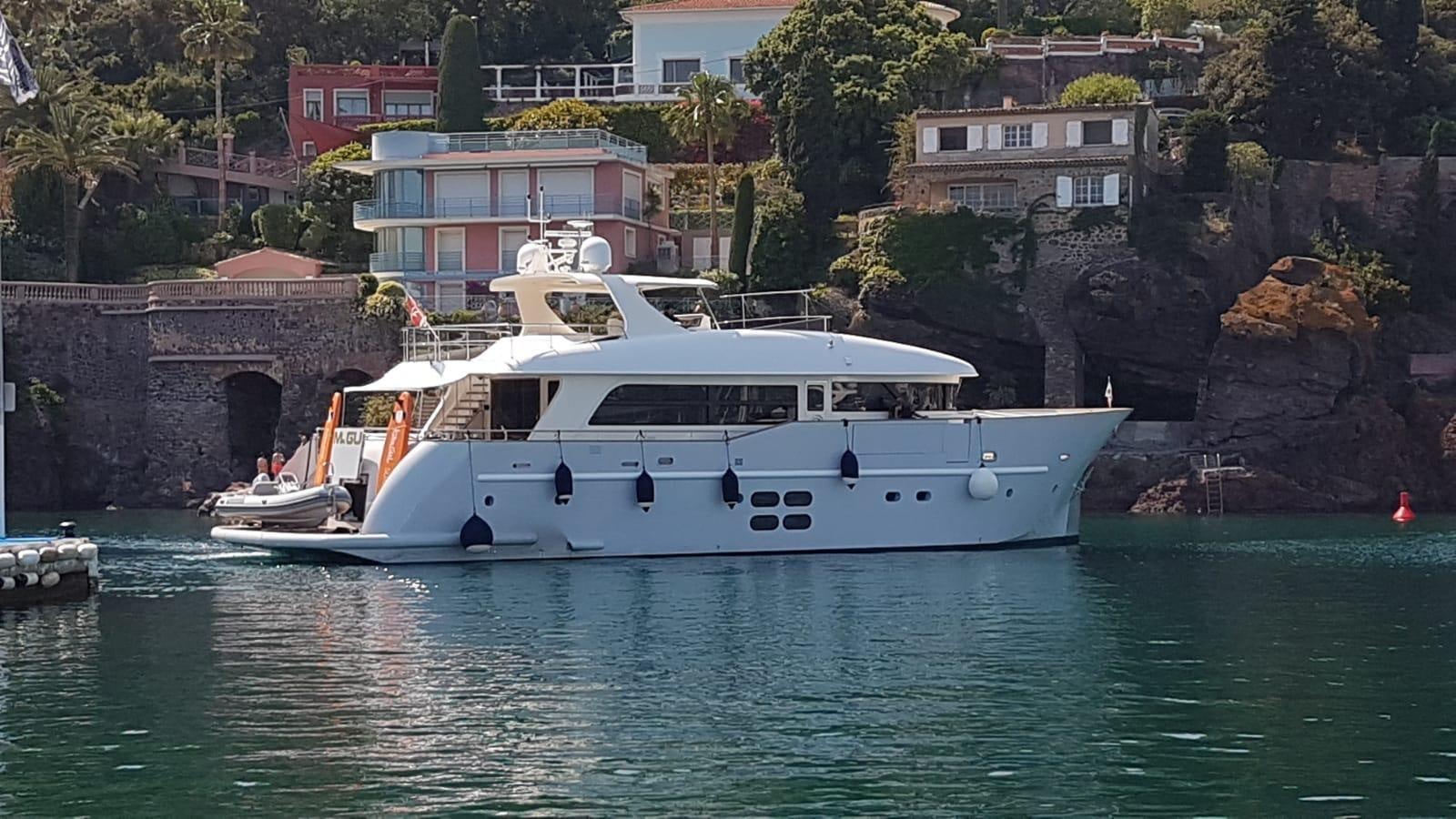 a boat on the water aboard MR. GU Yacht for Sale