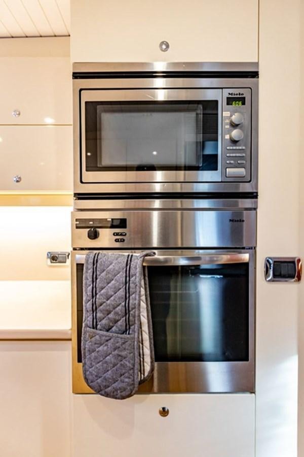 a towel on a microwave aboard HISTORY Yacht for Sale