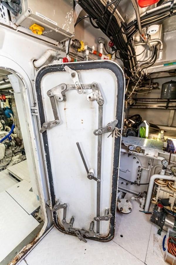 a machine with a large metal cylinder aboard HISTORY Yacht for Sale