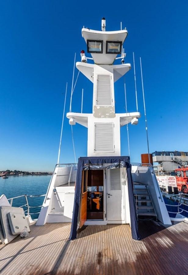 a white tower on a dock aboard HISTORY Yacht for Sale