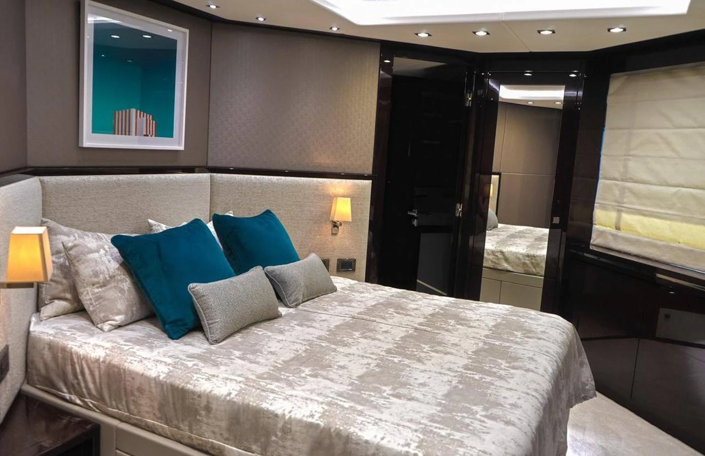 a bed with pillows and pillows aboard QART HADASHT Yacht for Sale