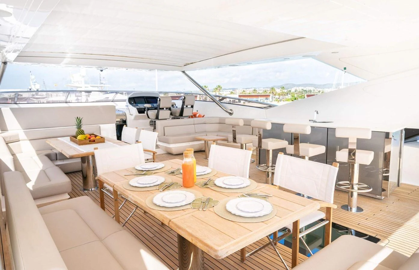 a room with a table and chairs aboard QART HADASHT Yacht for Sale