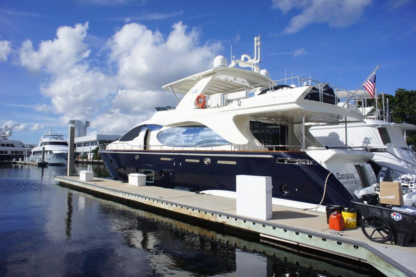 a large white boat docked aboard CASPIAN Yacht for Sale