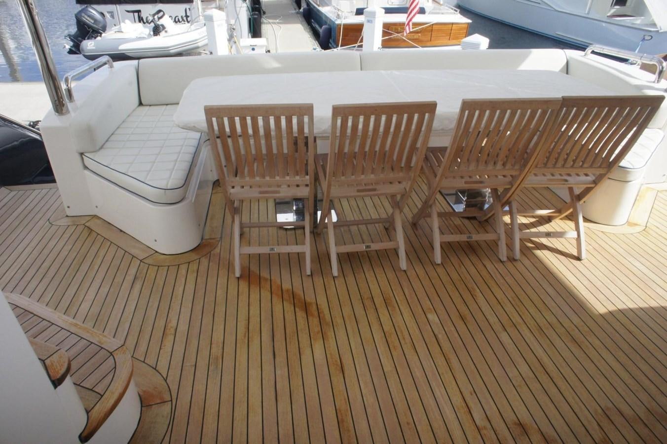 a group of chairs on a deck aboard CASPIAN Yacht for Sale
