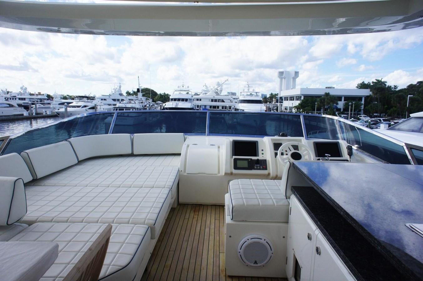 a deck with a large cruise ship in the background aboard CASPIAN Yacht for Sale