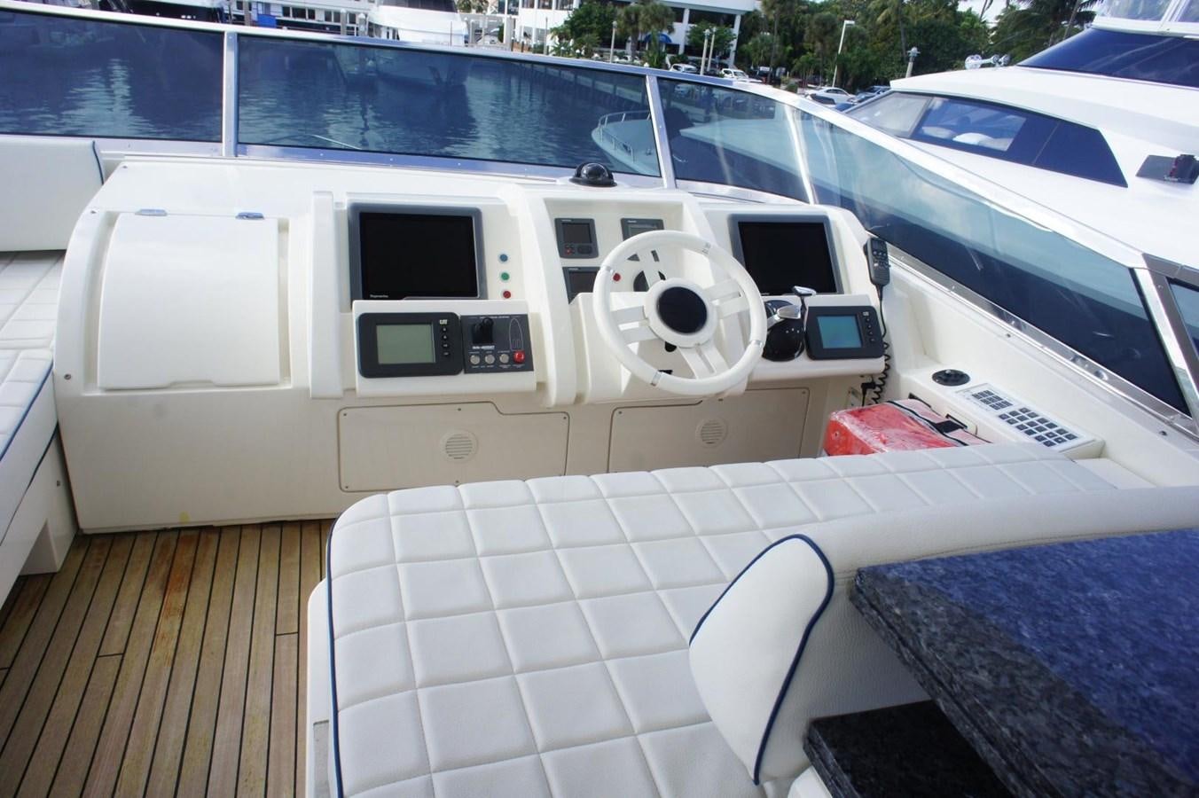 a white car with a large white screen on the back of it aboard CASPIAN Yacht for Sale