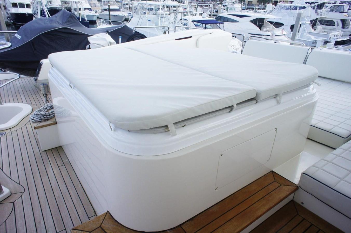 a white boat on a deck aboard CASPIAN Yacht for Sale