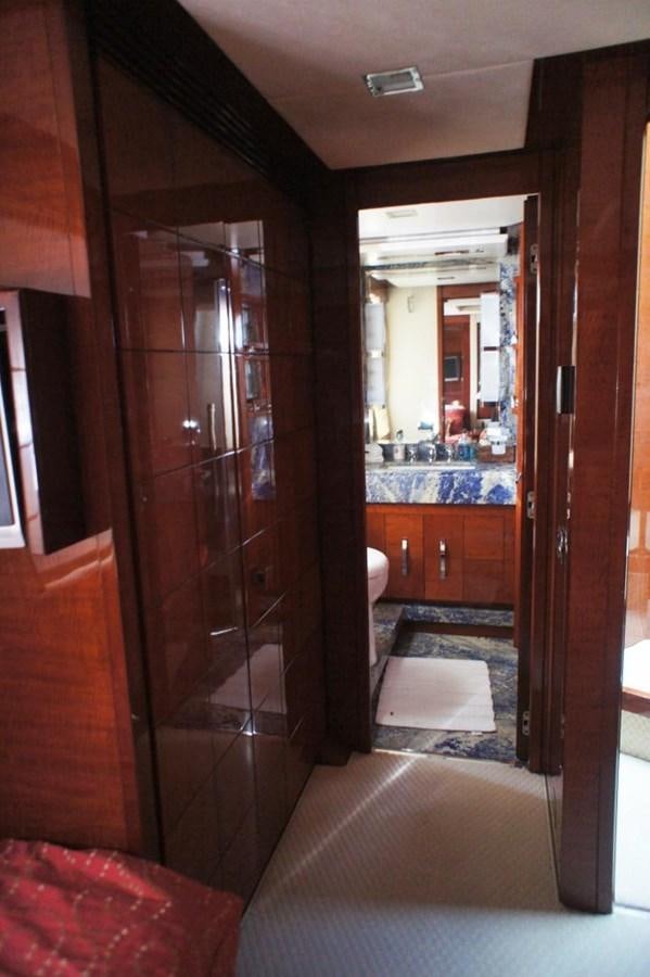a room with a wood door aboard CASPIAN Yacht for Sale