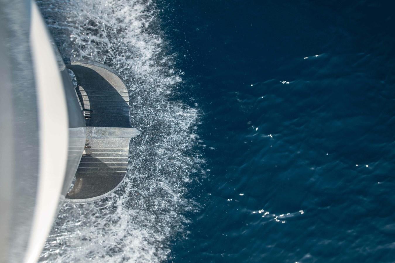 a plane flying over a body of water aboard 2019 SANLORENZO SX76 #16 Yacht for Sale