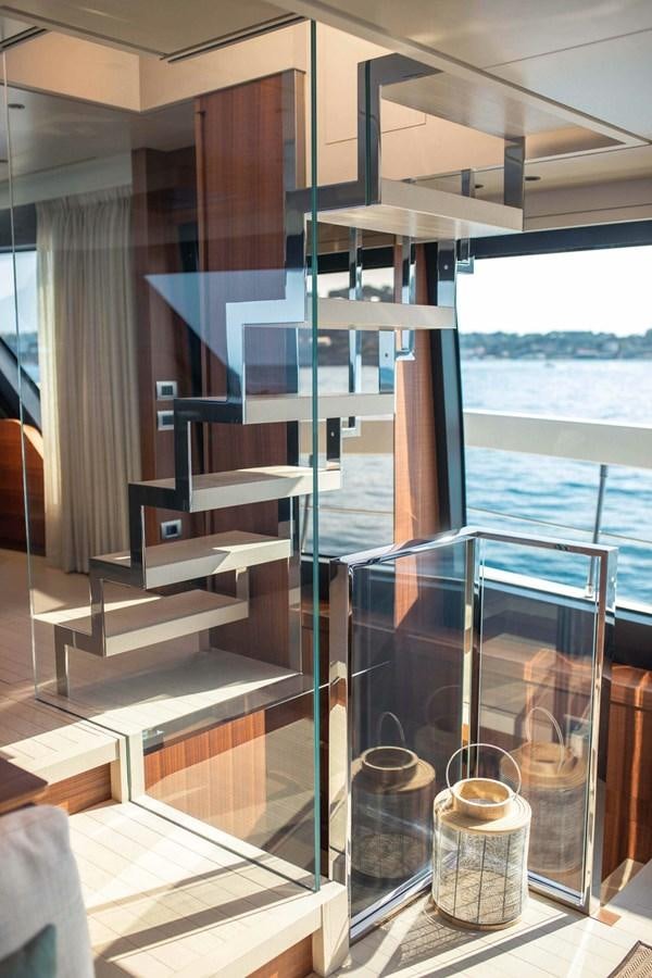 a glass case with a shelf aboard 2019 SANLORENZO SX76 #16 Yacht for Sale