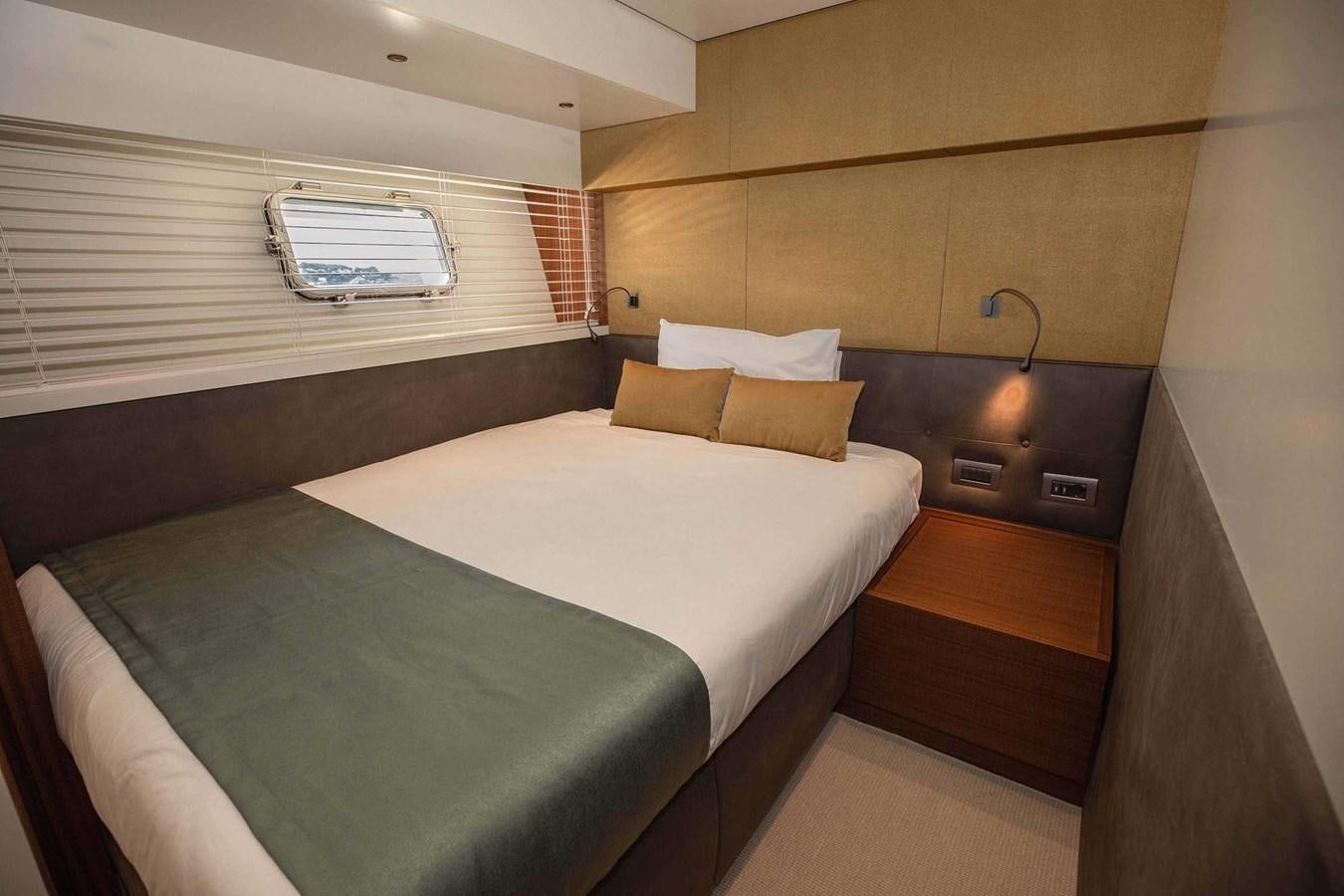 a bed in a room aboard 2019 SANLORENZO SX76 #16 Yacht for Sale