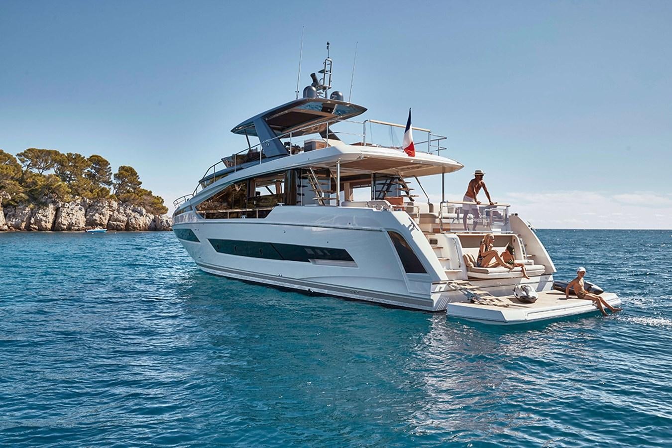 a couple of people on a boat aboard 2022 PRESTIGE X70 #09 Yacht for Sale