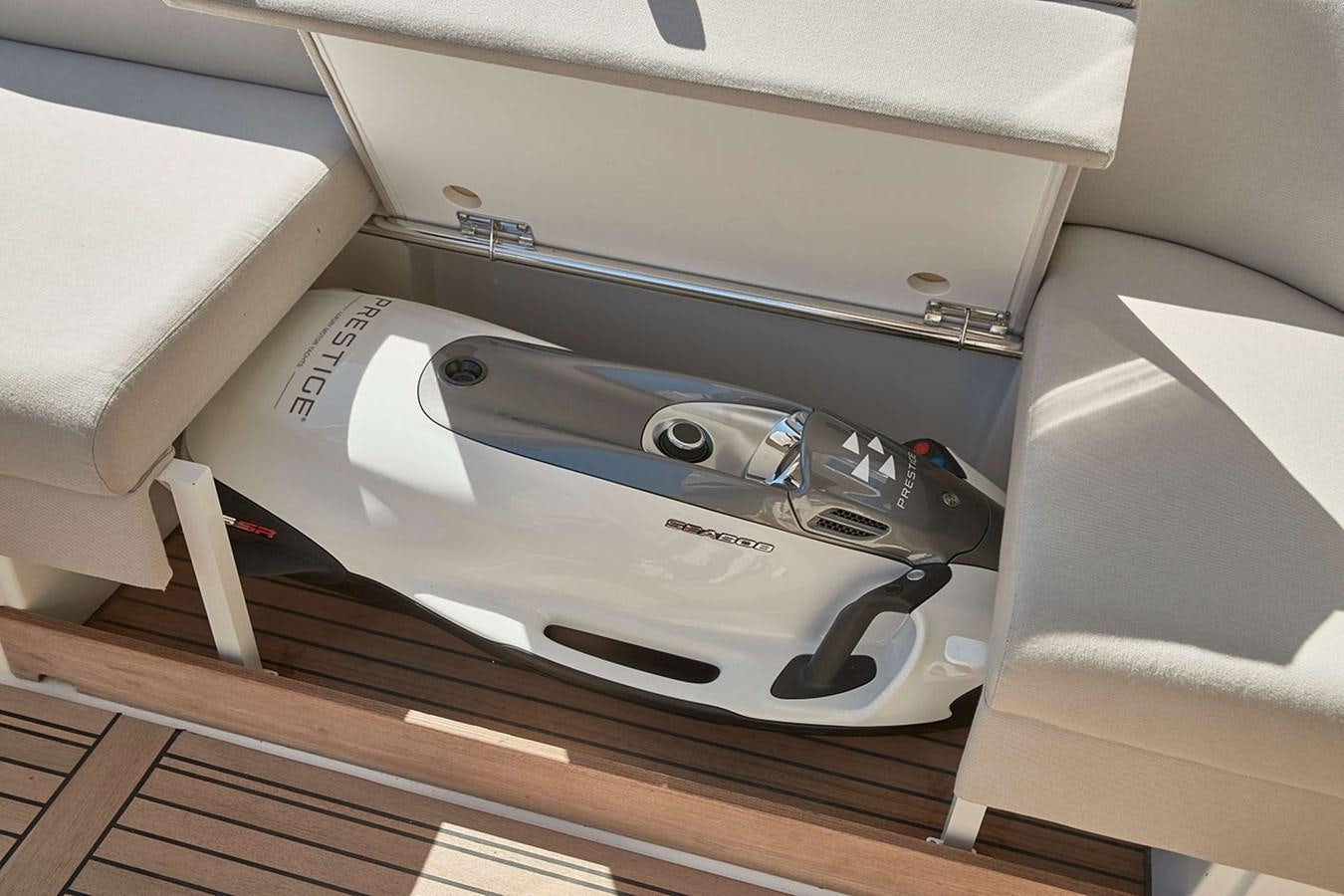 a silver and black tool box aboard 2022 PRESTIGE X70 #09 Yacht for Sale