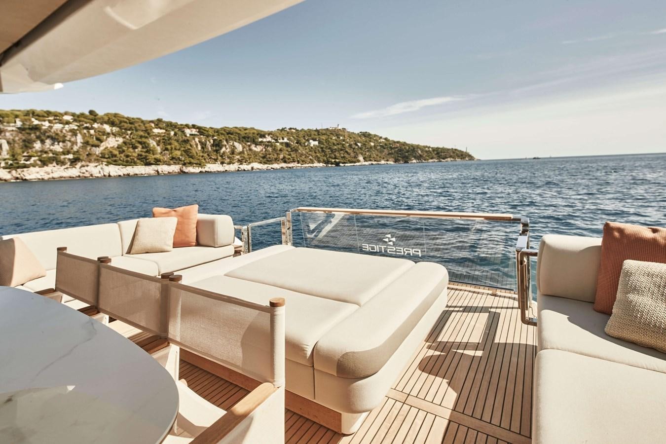 a boat on a deck aboard 2022 PRESTIGE X70 #09 Yacht for Sale