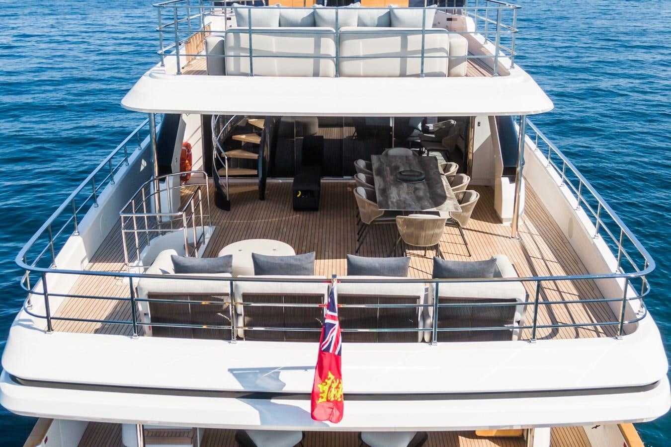 a boat with chairs on it aboard MRS L Yacht for Sale