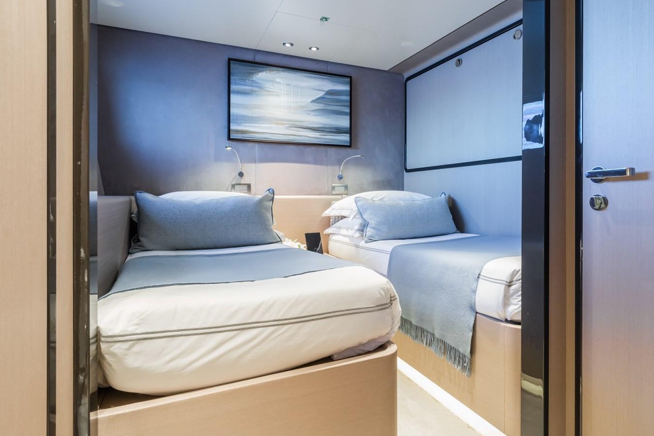 a room with two beds aboard MRS L Yacht for Sale