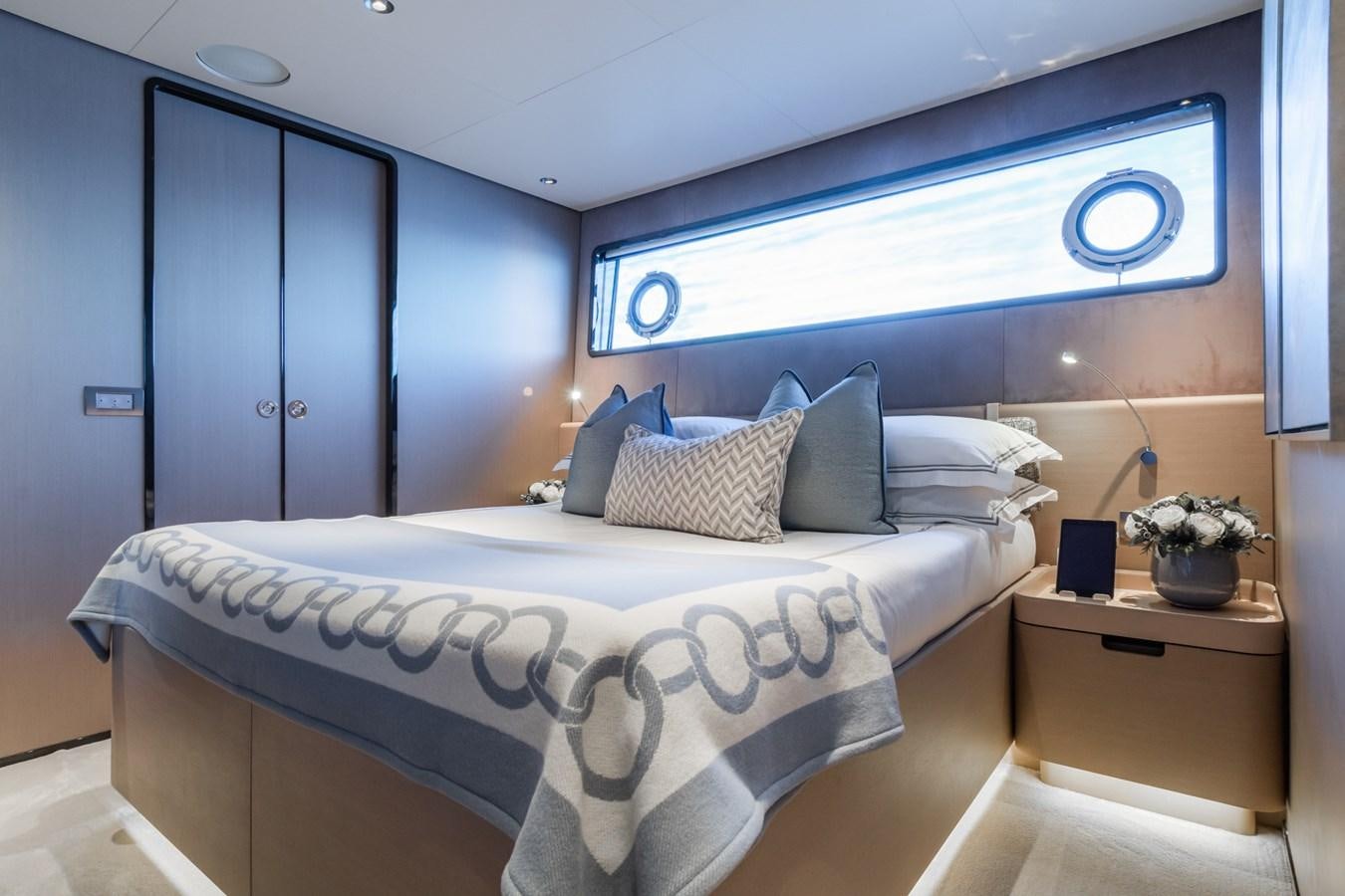 a bed in a room aboard MRS L Yacht for Sale