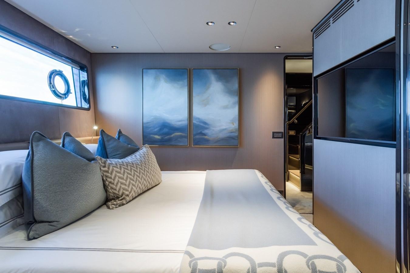 a bed in a room aboard MRS L Yacht for Sale