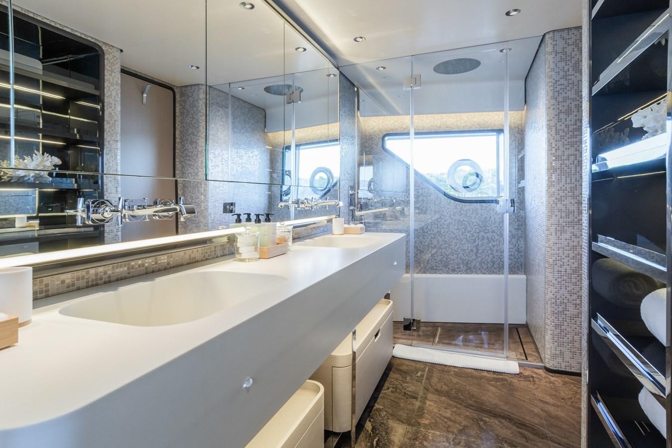 a large bathroom with a large sink aboard MRS L Yacht for Sale