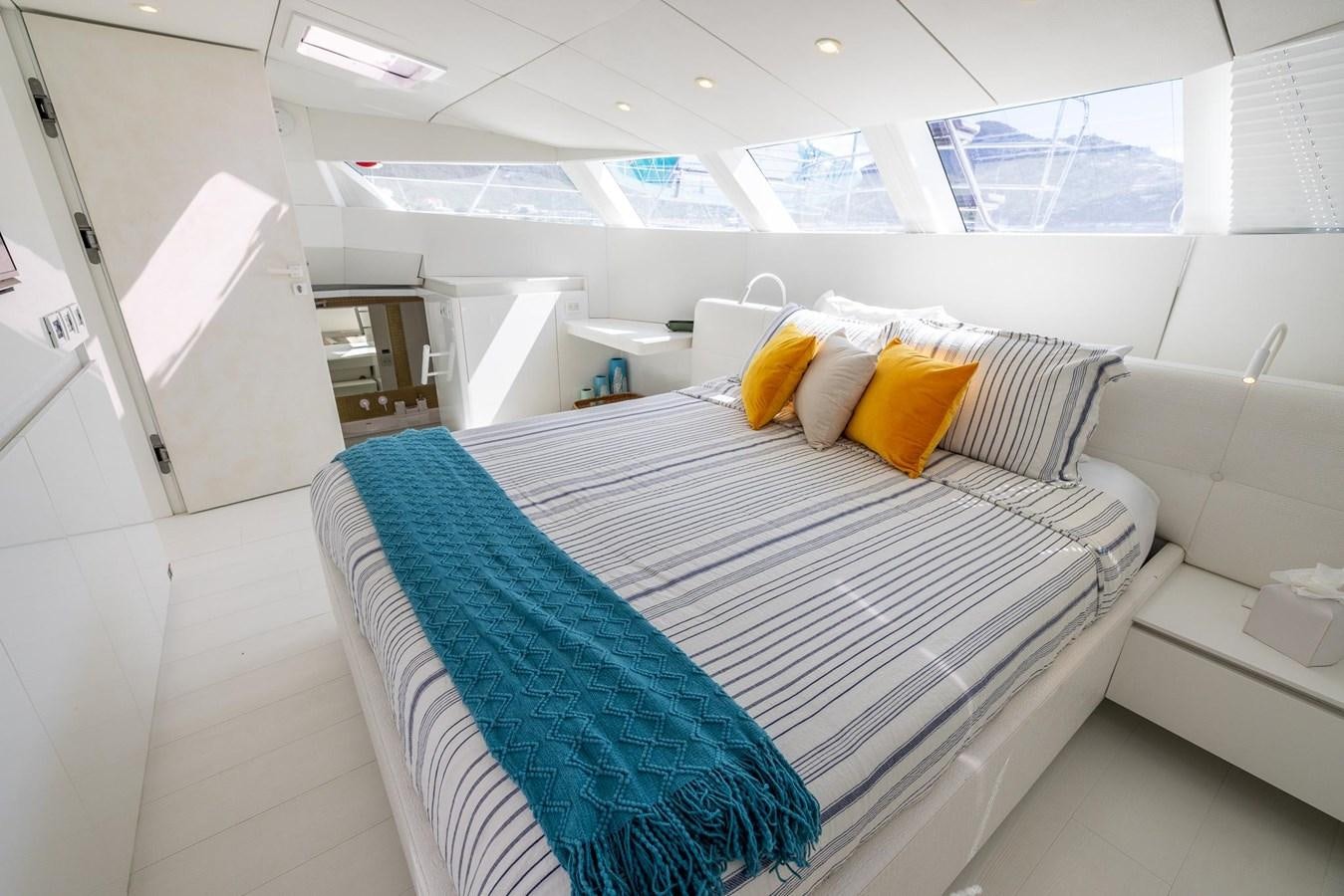 a bed with pillows aboard VALHALLA Yacht for Sale