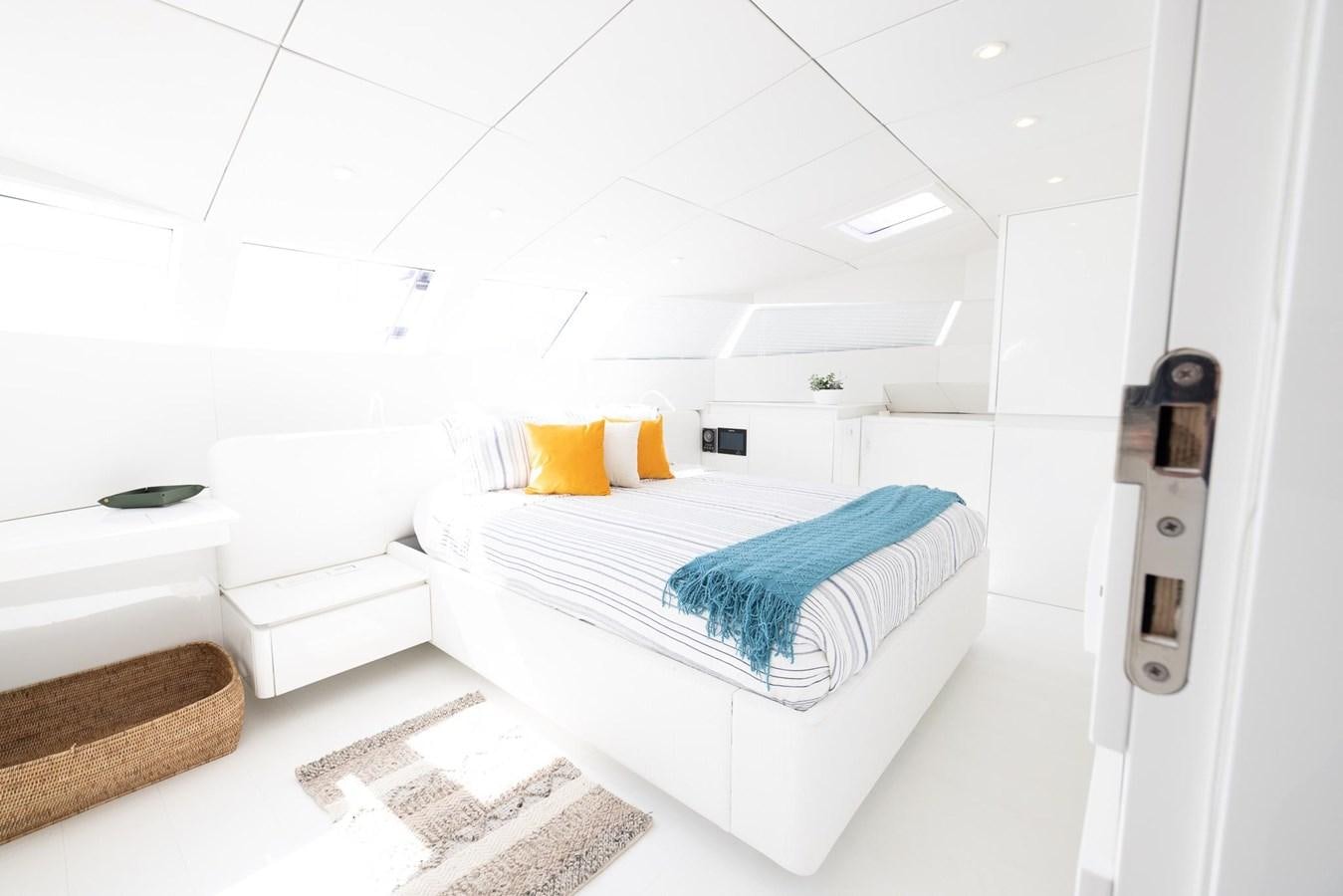 a room with a bed and a pillow aboard VALHALLA Yacht for Sale