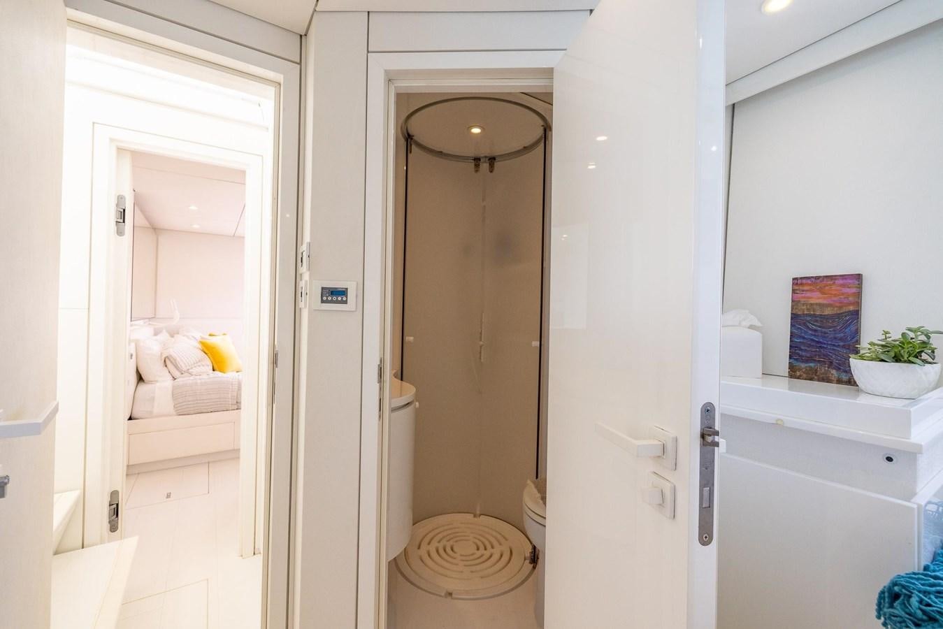a bathroom with a glass door aboard VALHALLA Yacht for Sale