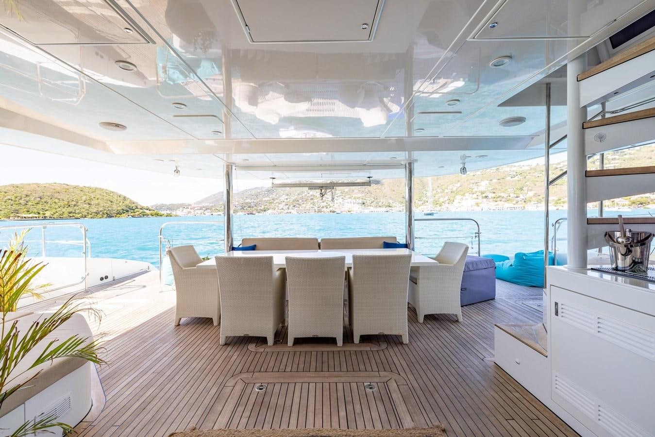 a room with a table and chairs aboard VALHALLA Yacht for Sale