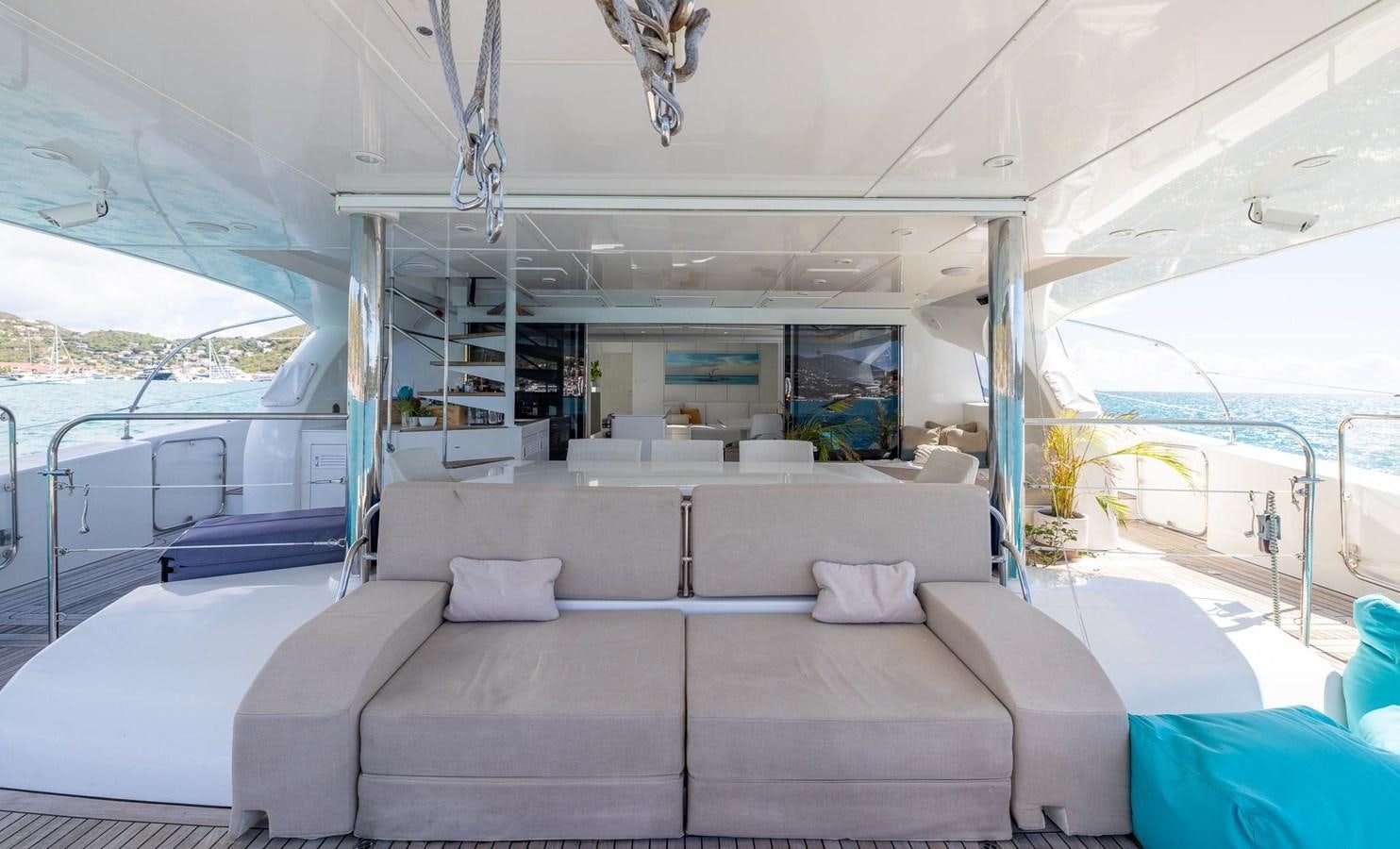 a white couch in a boat aboard VALHALLA Yacht for Sale