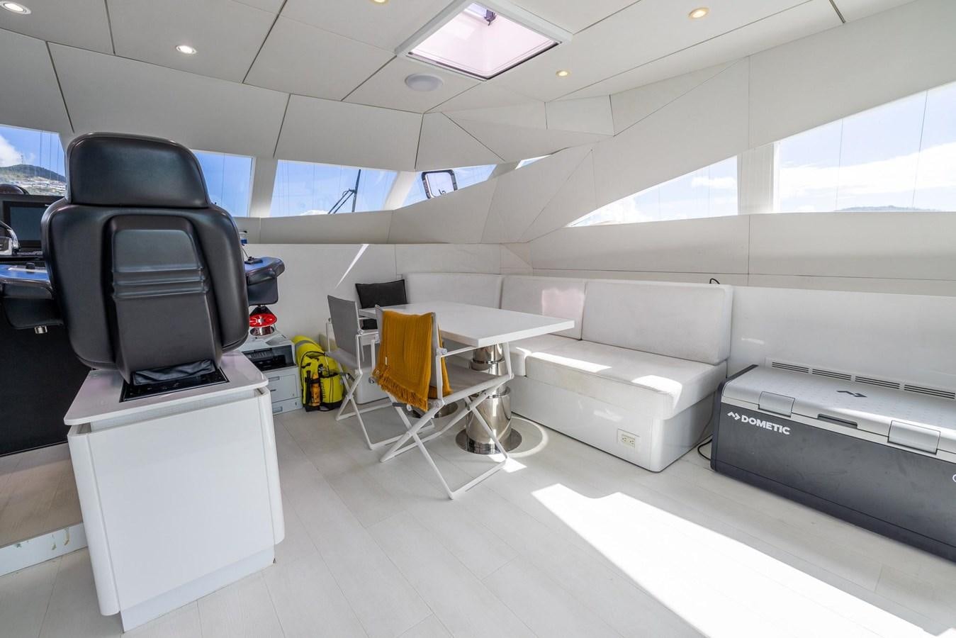 a room with computers and chairs aboard VALHALLA Yacht for Sale