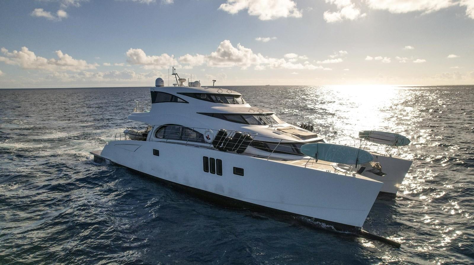 a white yacht on the water aboard VALHALLA Yacht for Sale