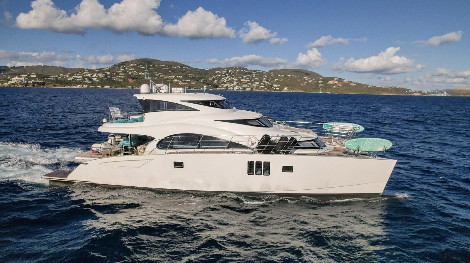 a white yacht on the water aboard VALHALLA Yacht for Sale