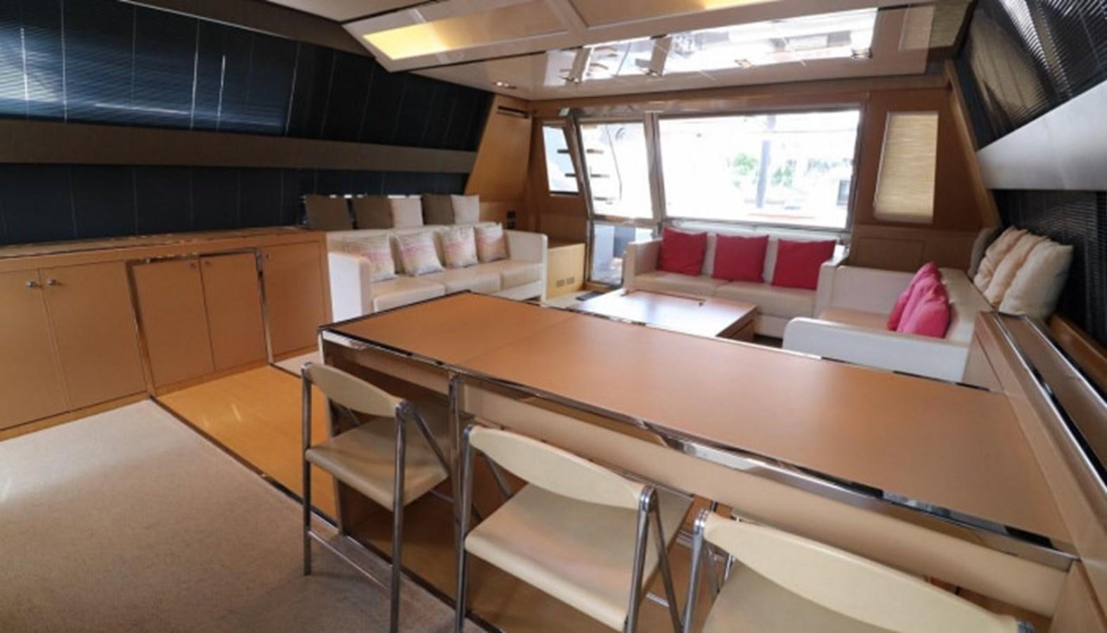 a room with a table and chairs aboard SILVER BREEZE Yacht for Sale