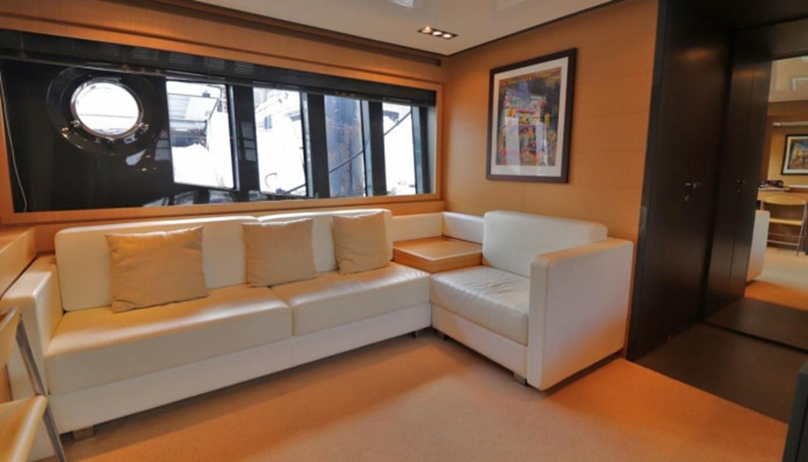 a living room with a couch aboard SILVER BREEZE Yacht for Sale