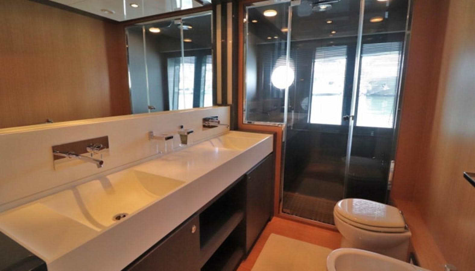 a bathroom with a sink and a toilet aboard SILVER BREEZE Yacht for Sale