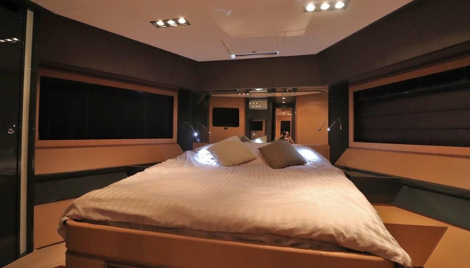 a large bed in a room aboard SILVER BREEZE Yacht for Sale