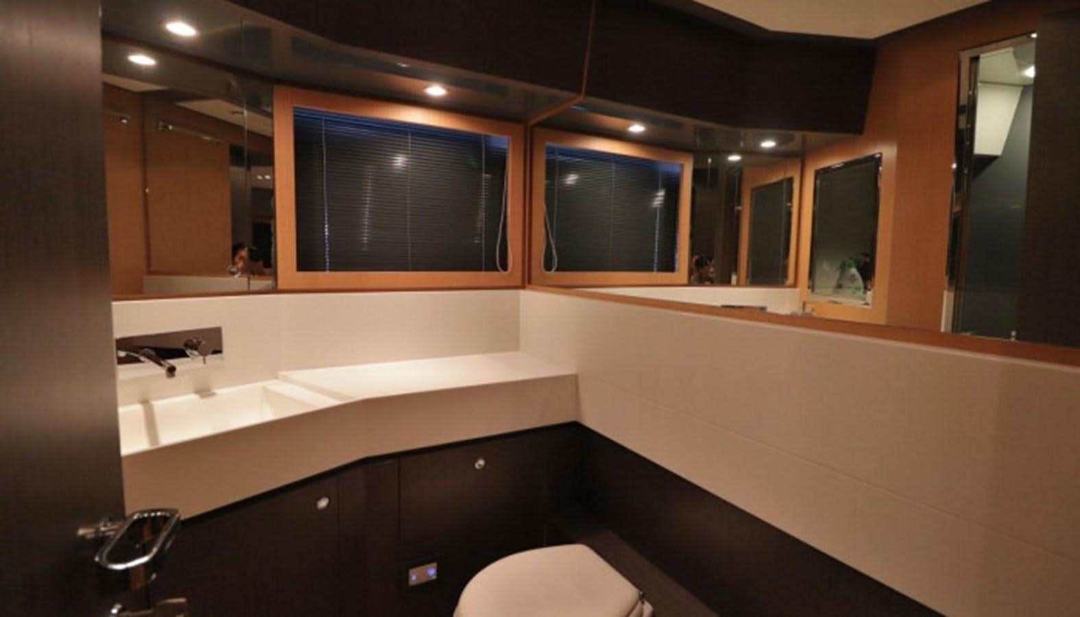 a bathroom with sinks and mirrors aboard SILVER BREEZE Yacht for Sale