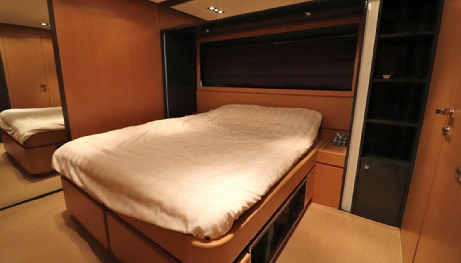 a bed in a room aboard SILVER BREEZE Yacht for Sale