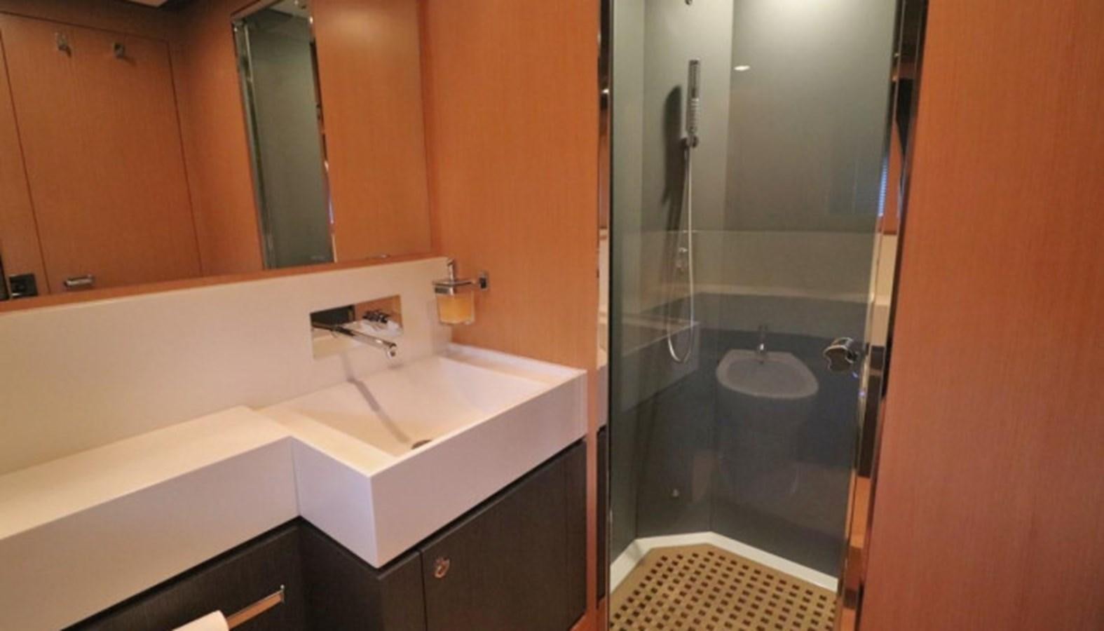 a bathroom with a glass shower aboard SILVER BREEZE Yacht for Sale