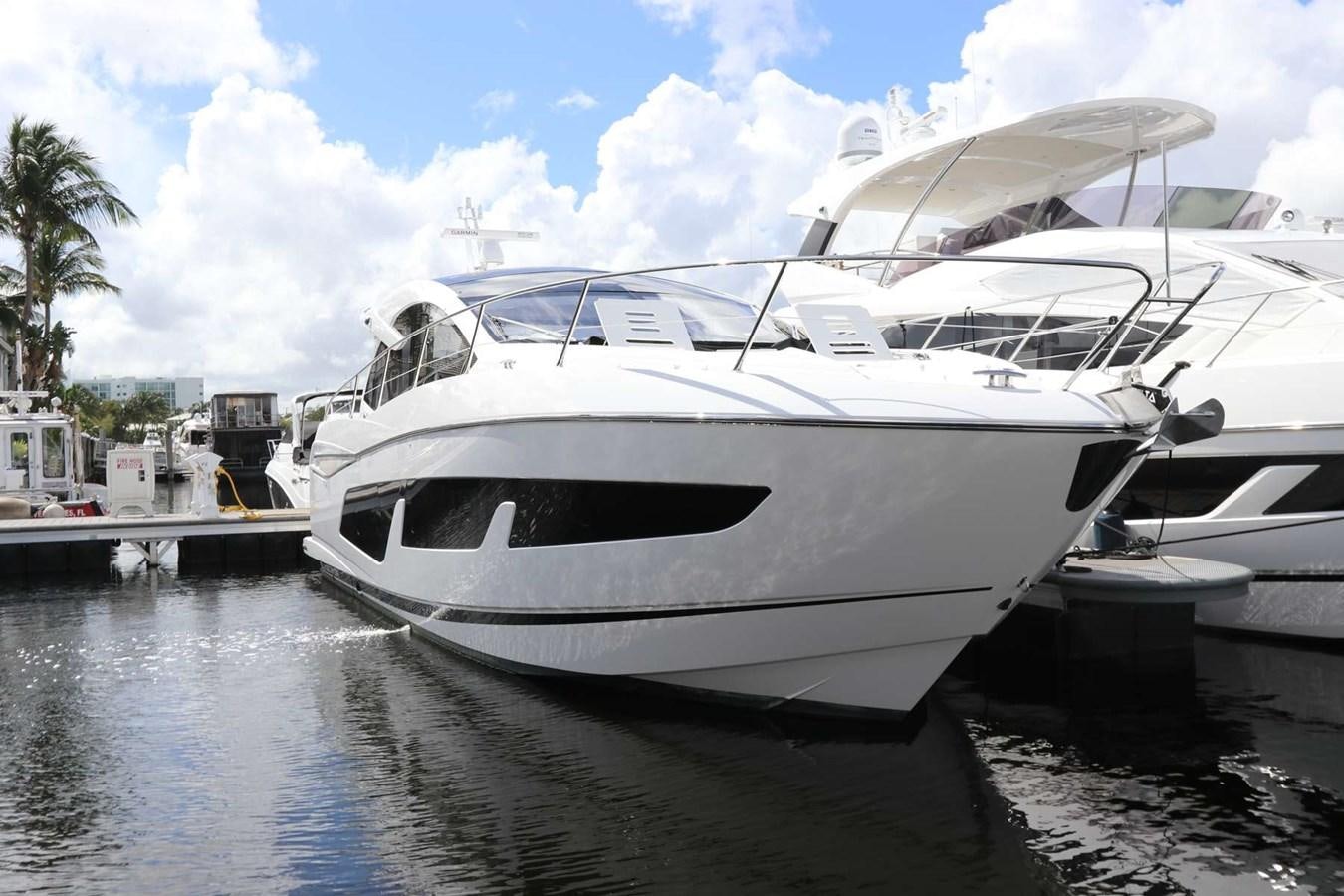 a white yacht docked aboard LYDIA SWAG Yacht for Sale