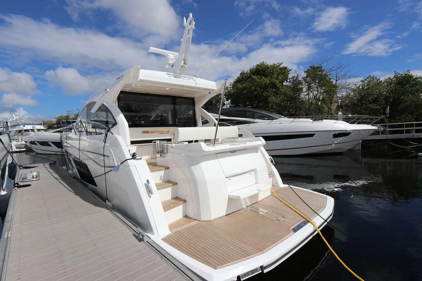 a boat docked at a pier aboard LYDIA SWAG Yacht for Sale
