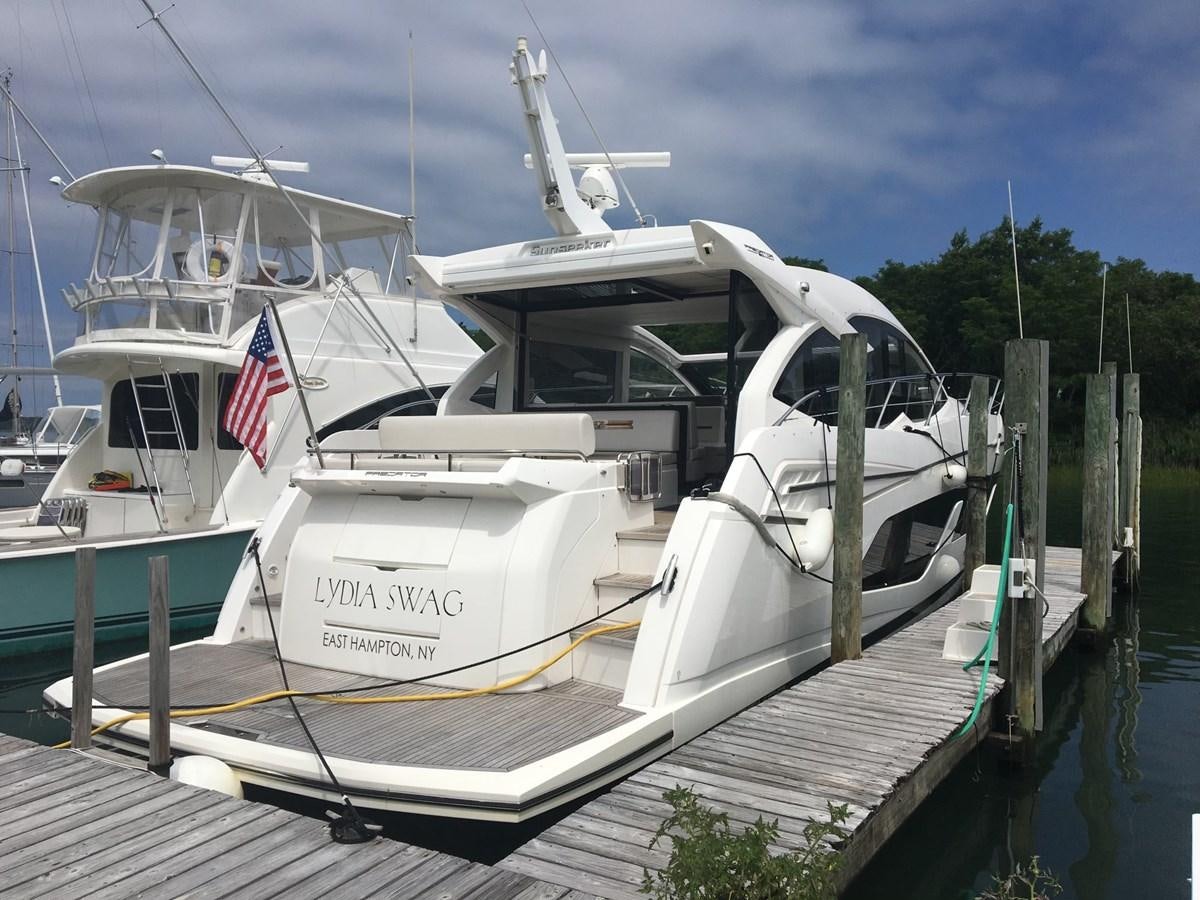 a boat docked at a pier aboard LYDIA SWAG Yacht for Sale