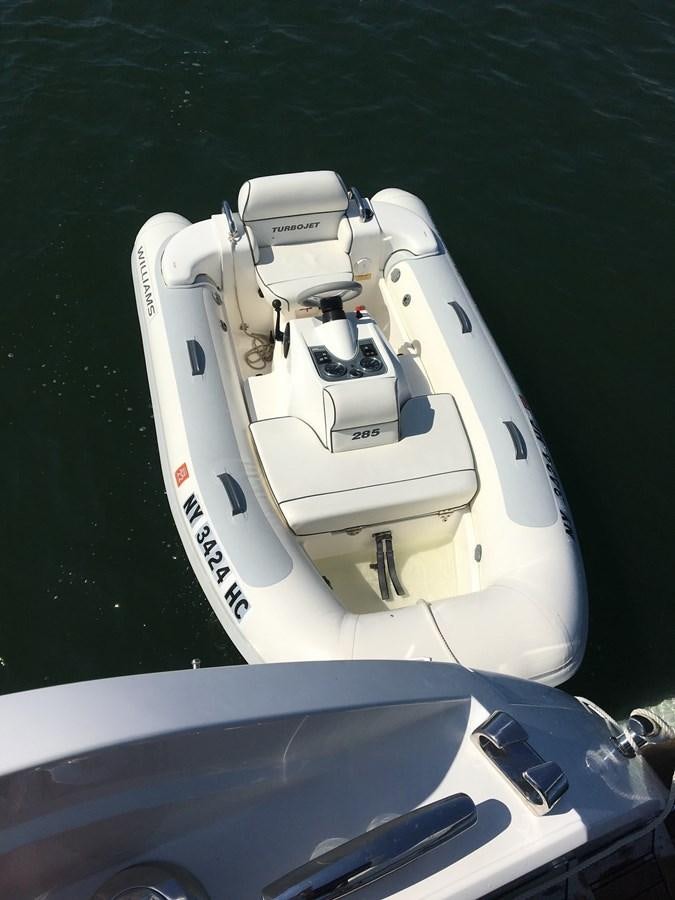 a white boat on water aboard LYDIA SWAG Yacht for Sale