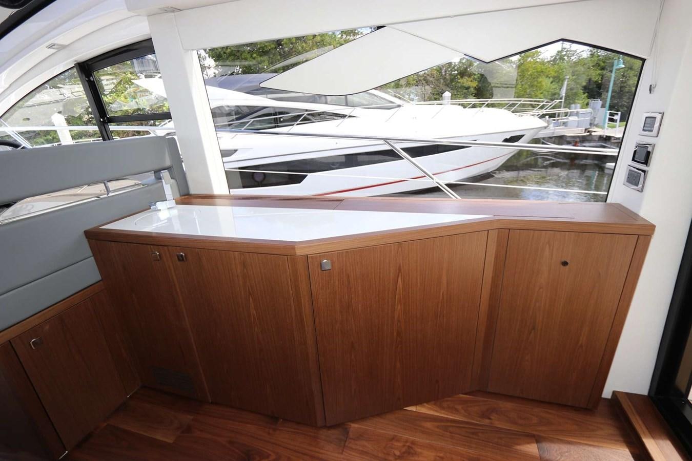 a wooden cabinet in a room aboard LYDIA SWAG Yacht for Sale
