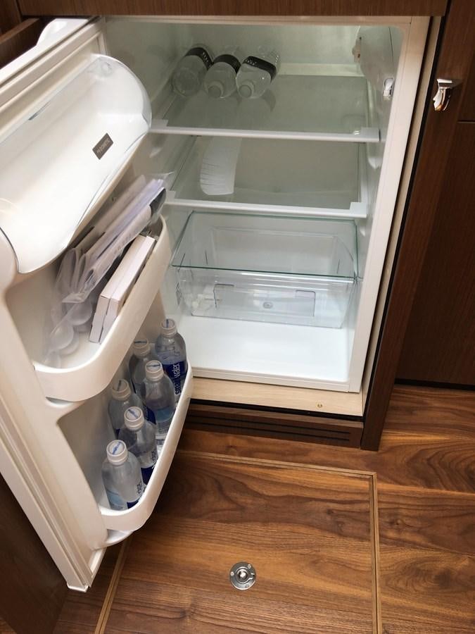 a refrigerator with its door open aboard LYDIA SWAG Yacht for Sale