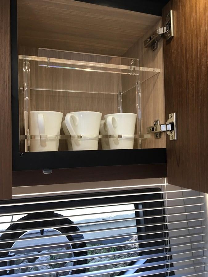 a bathroom with a large mirror aboard LYDIA SWAG Yacht for Sale