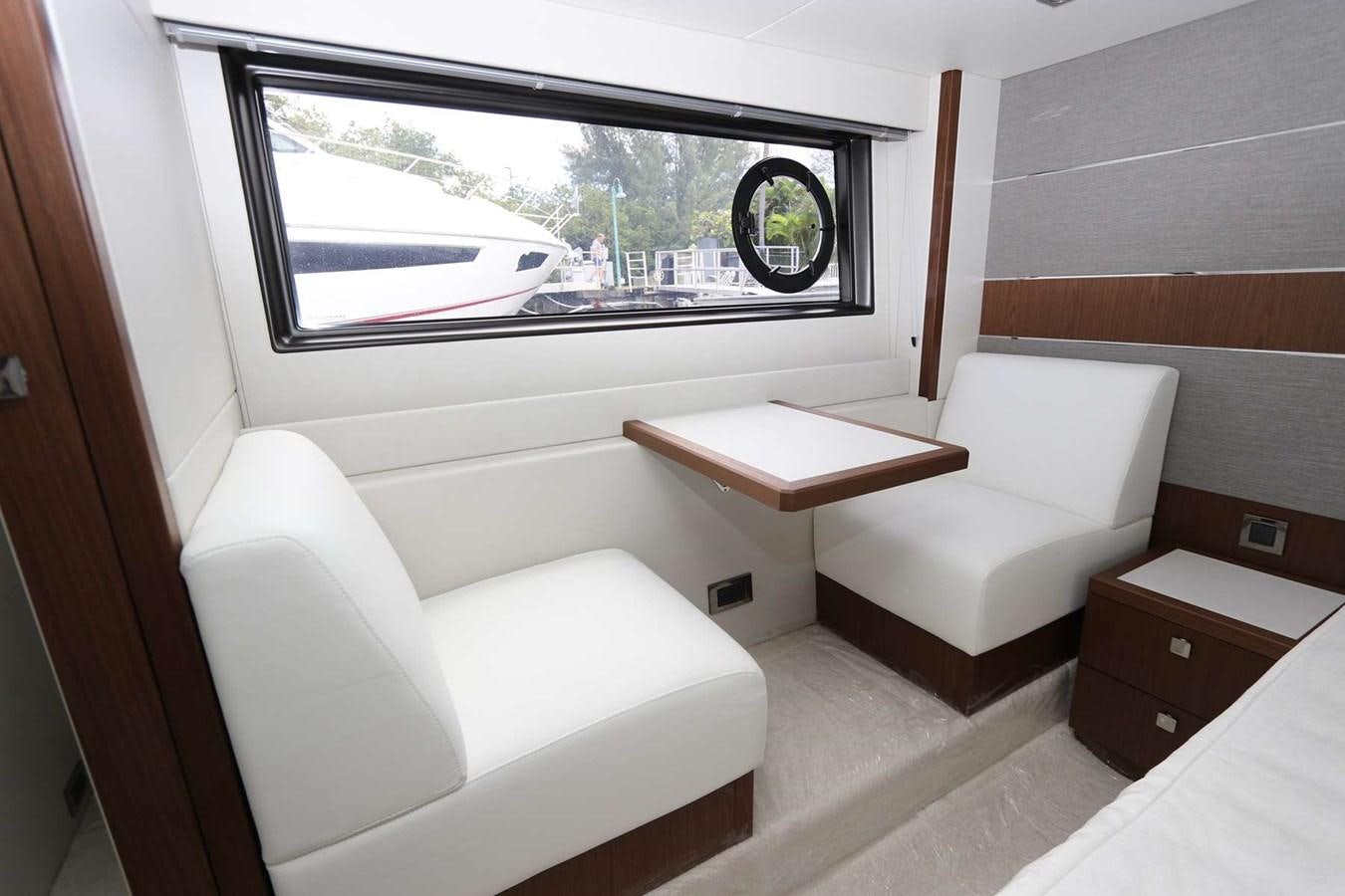 a room with a bed and a window aboard LYDIA SWAG Yacht for Sale