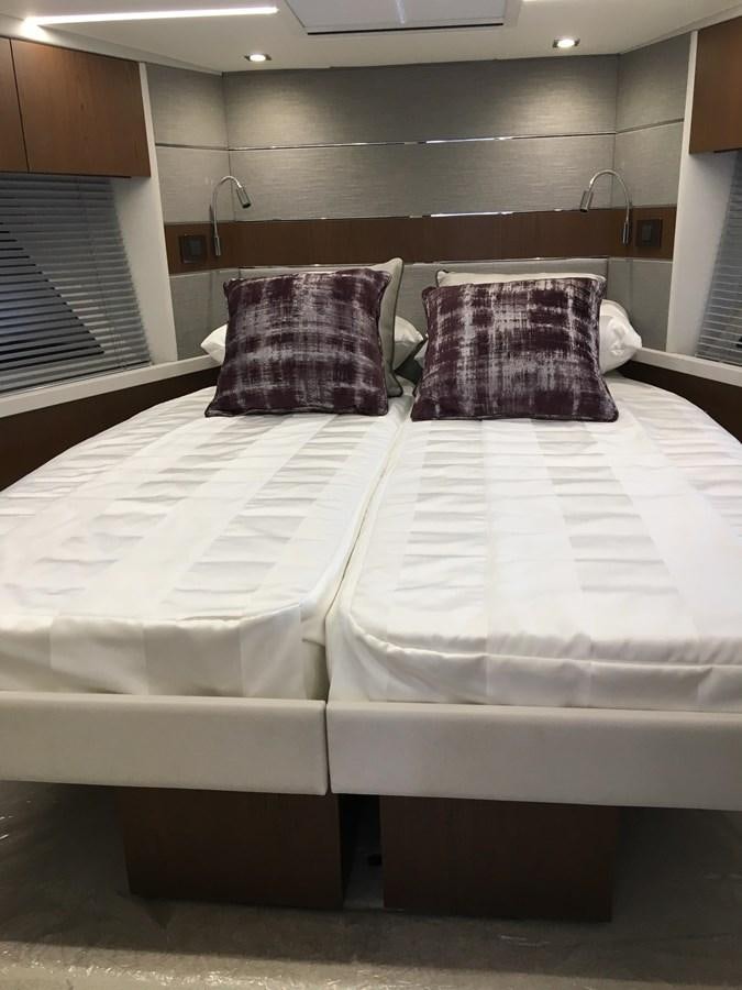 a couple of beds in a room aboard LYDIA SWAG Yacht for Sale