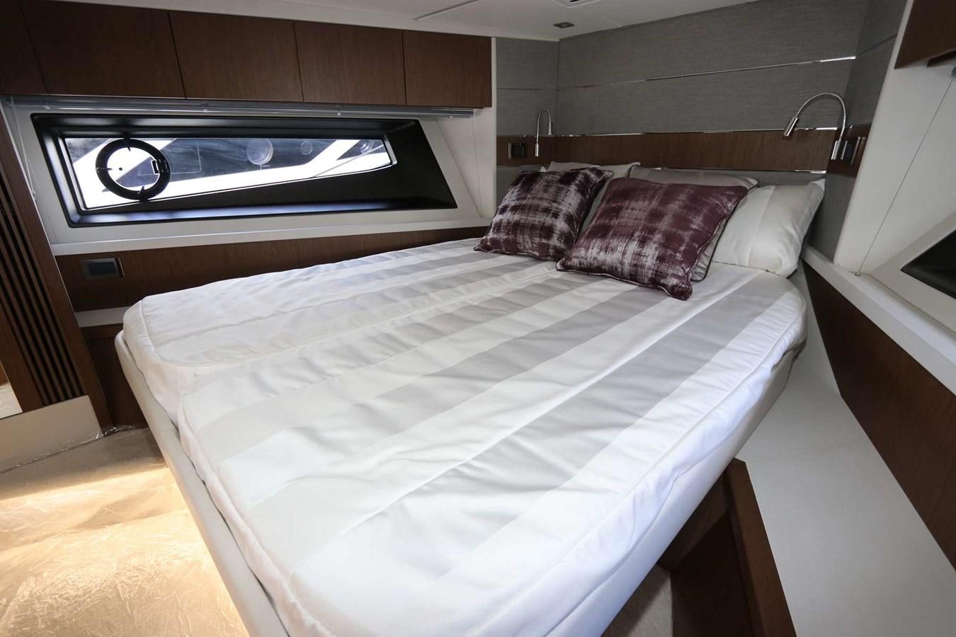 a bed in a room aboard LYDIA SWAG Yacht for Sale