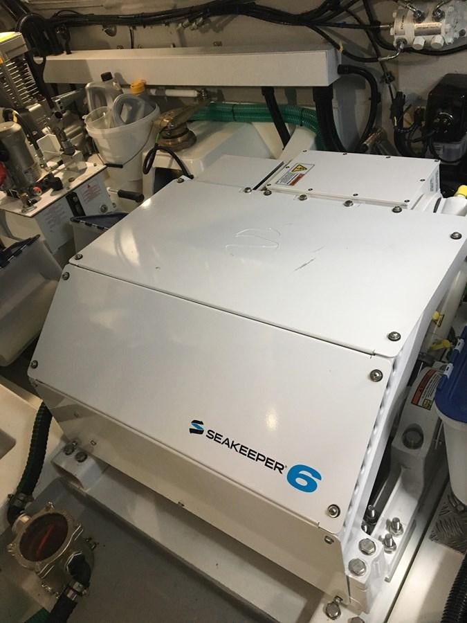 a white machine with a blue label aboard LYDIA SWAG Yacht for Sale