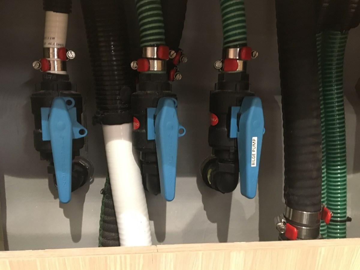 a group of different colored electric guitars aboard LYDIA SWAG Yacht for Sale